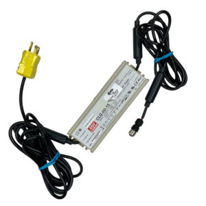 A CEIA TE/SLD Power Supply featuring black cables, a yellow plug, and visible product label on the unit.