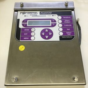 Fortress Phantom Keypad & Display Board with buttons and screen, mounted on a stainless steel surface.