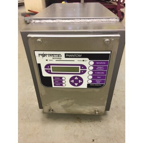 Fortress Technology Head Only 8" x 4" with display and navigation buttons placed on a concrete floor.