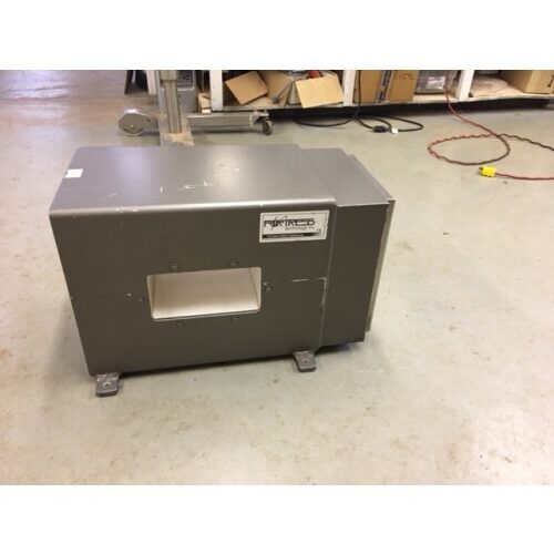 Fortress Technology Head Only 8" x 4" mounted on a wall above assorted cables and boxes.