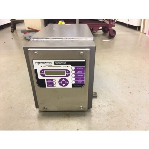Fortress Technology Head Only 8" x 4" with digital display and purple buttons mounted on a wall.