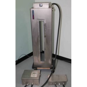 Goring Kerr DSP1 Metal Detector Head: tall, rectangular unit with vertical window, cables, and two control boxes on floor.