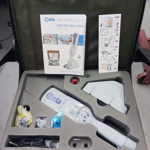 New Generation Compact Hand Held Metal Detection Set with accessories, manual, and labeled foam in a carrying case.