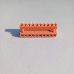 Pluggable Terminal Blocks 10 Position, orange, placed on a white surface.