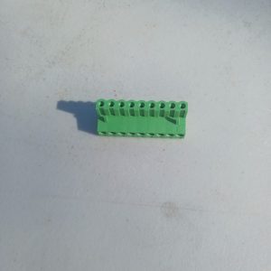 Pluggable Terminal Blocks 9 Position on a light grey surface under direct sunlight.